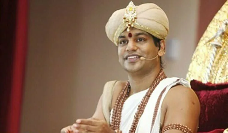 Un guru din India, dat în urmărire