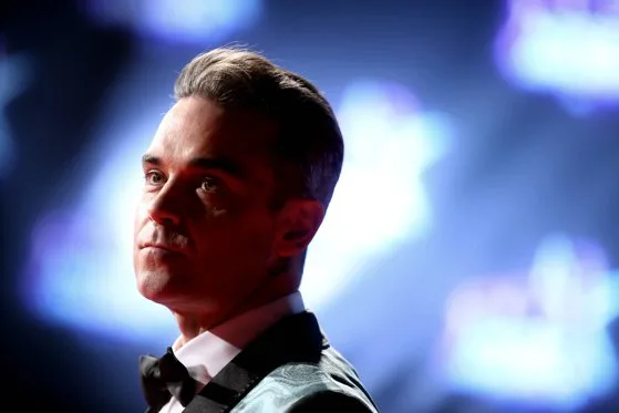 Robbie Williams l-a provocat pe cântărețul Liam Gallagher la un meci de box „profesionist”